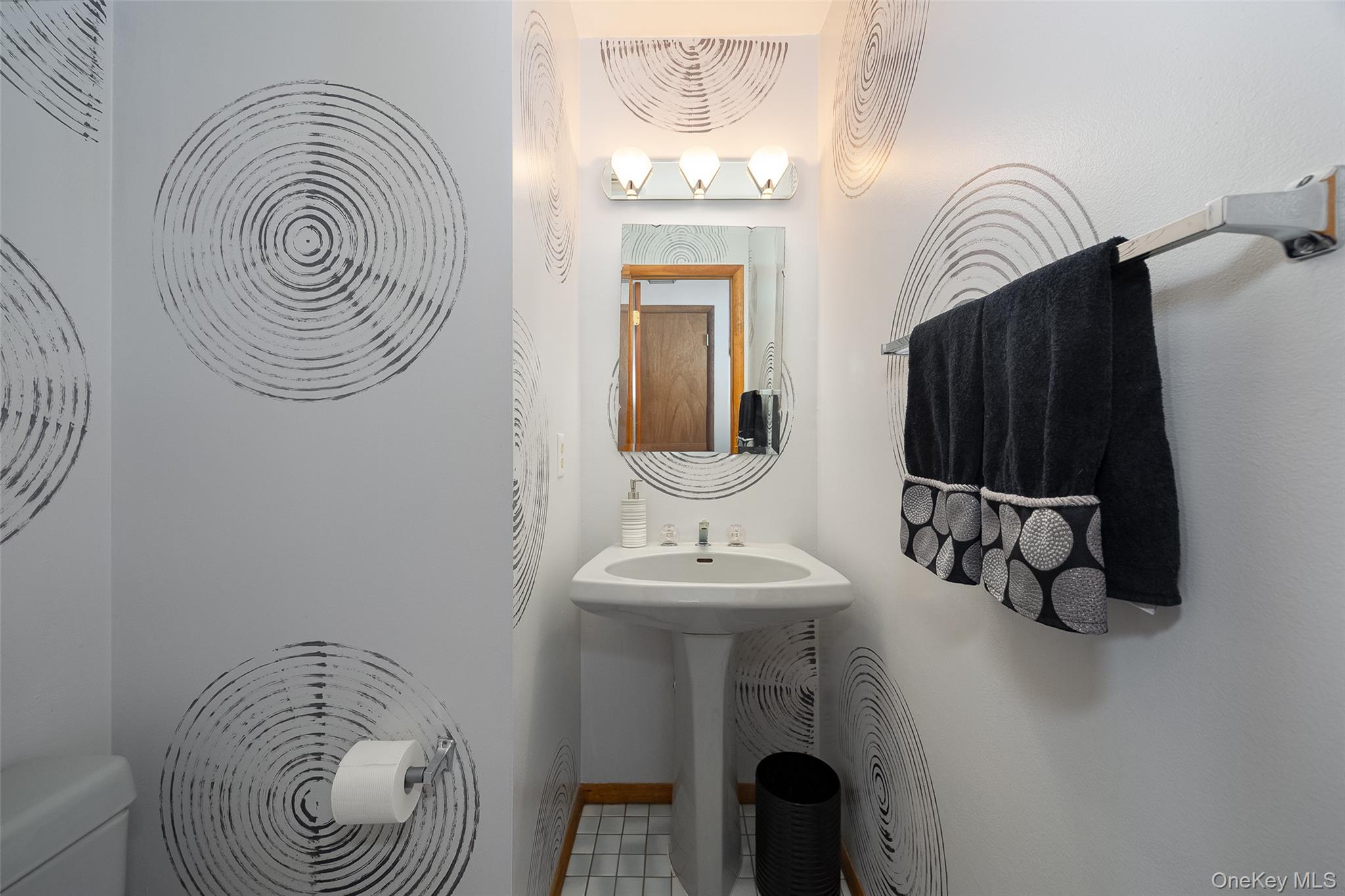 5 Chestnut Ridge Road Poughkeepsie, NY 12603 - Photo 16 of 39 a bathroom with a sink a mirror and a toilet