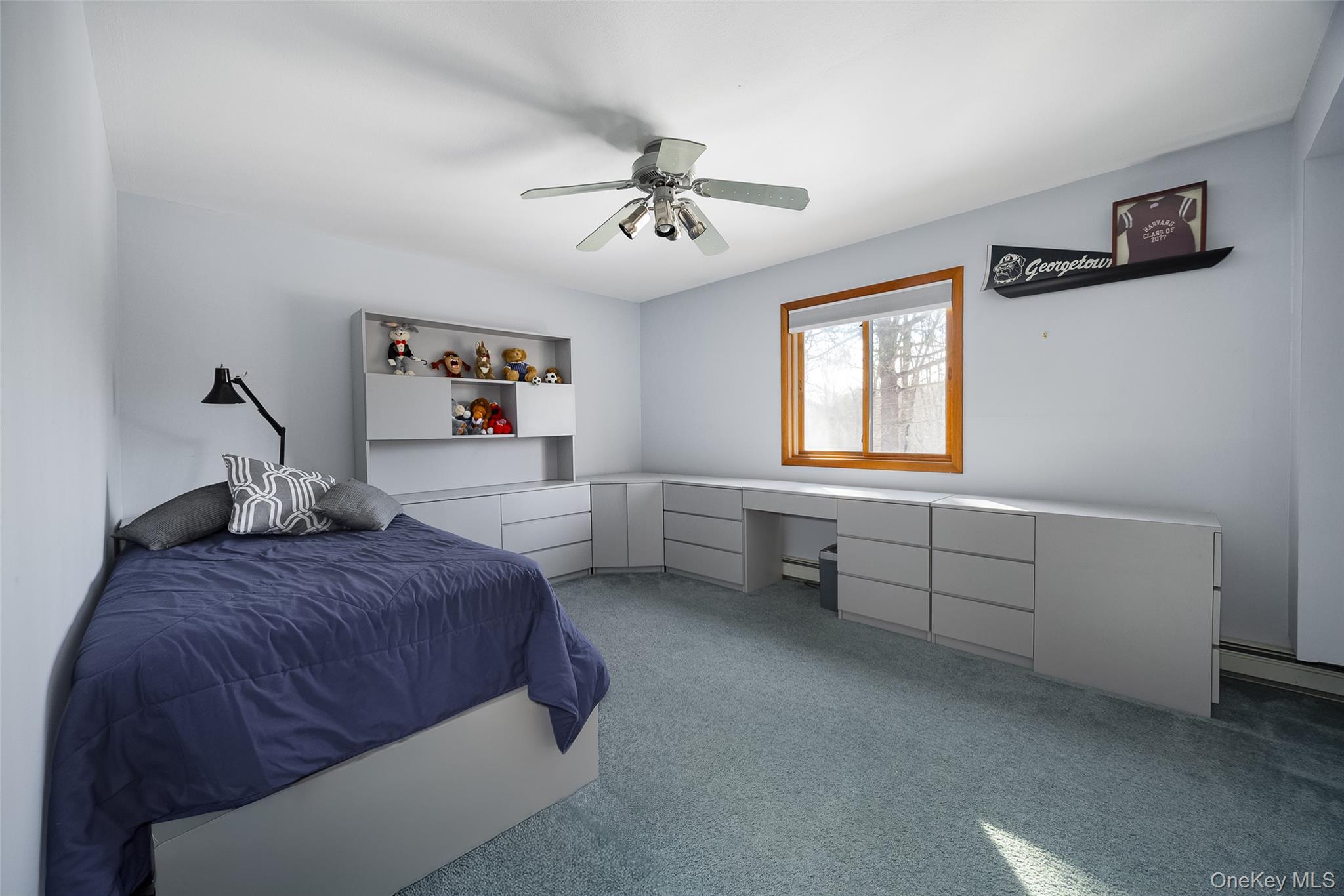 5 Chestnut Ridge Road Poughkeepsie, NY 12603 - Photo 22 of 39 a bedroom with a bed and a window