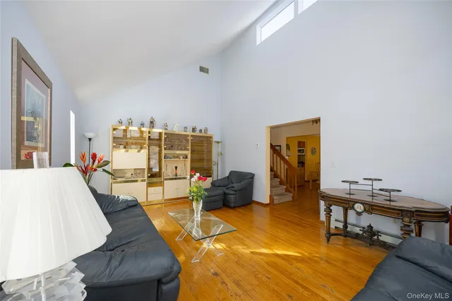 a living room with furniture and a table