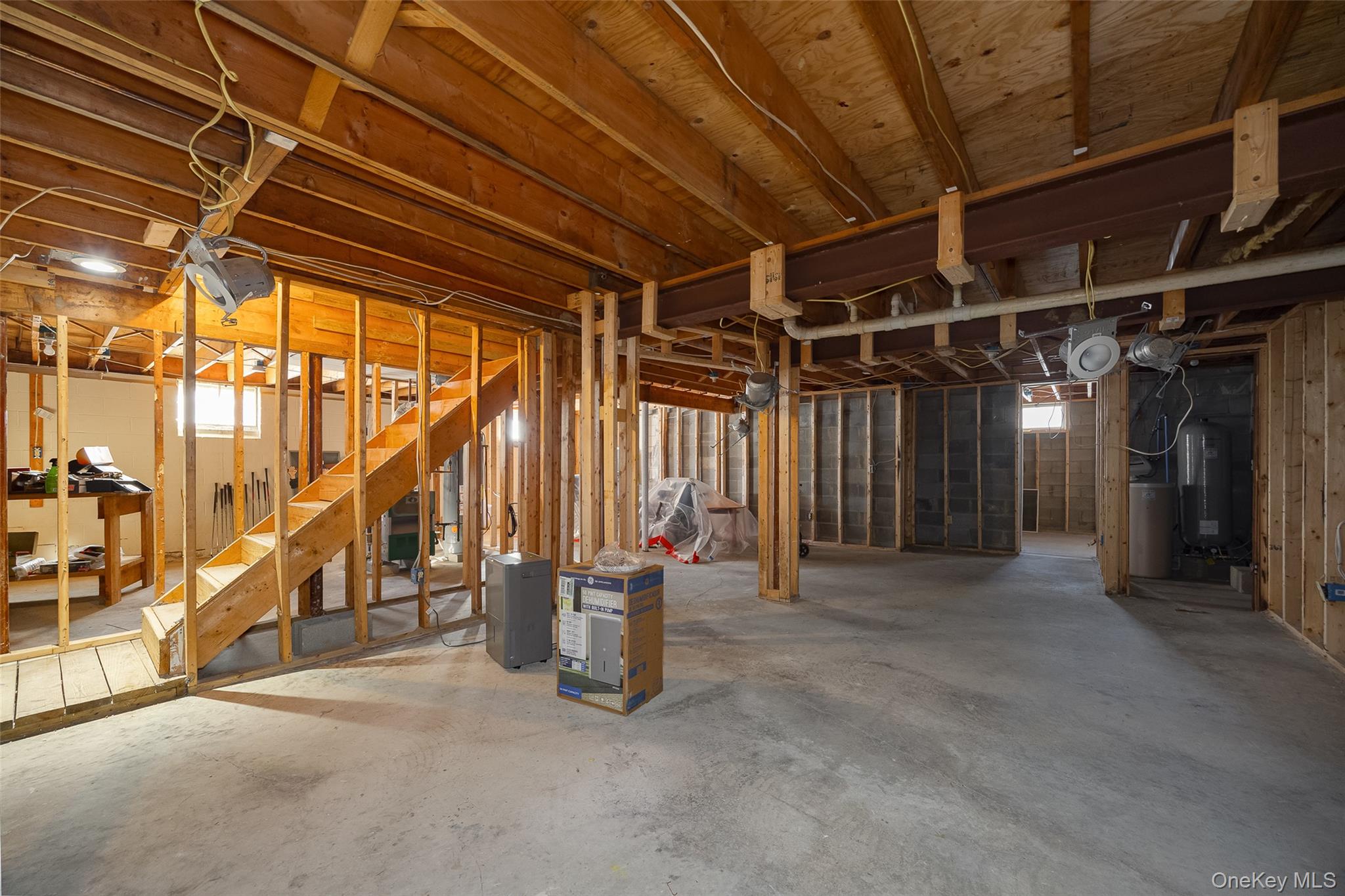 5 Chestnut Ridge Road Poughkeepsie, NY 12603 - Photo 38 of 39 a view of an empty room with wooden floor