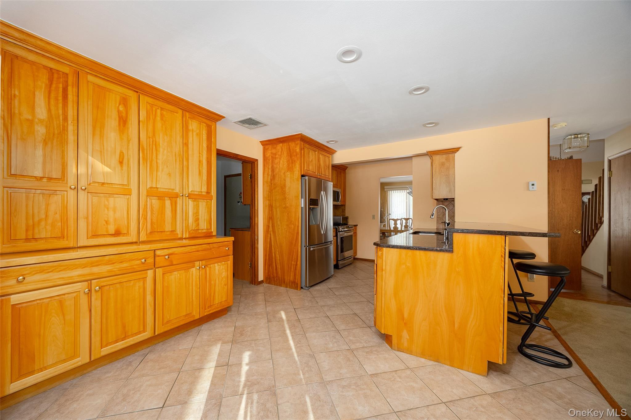 5 Chestnut Ridge Road Poughkeepsie, NY 12603 - Photo 4 of 39 a view of a kitchen with furniture and an empty room