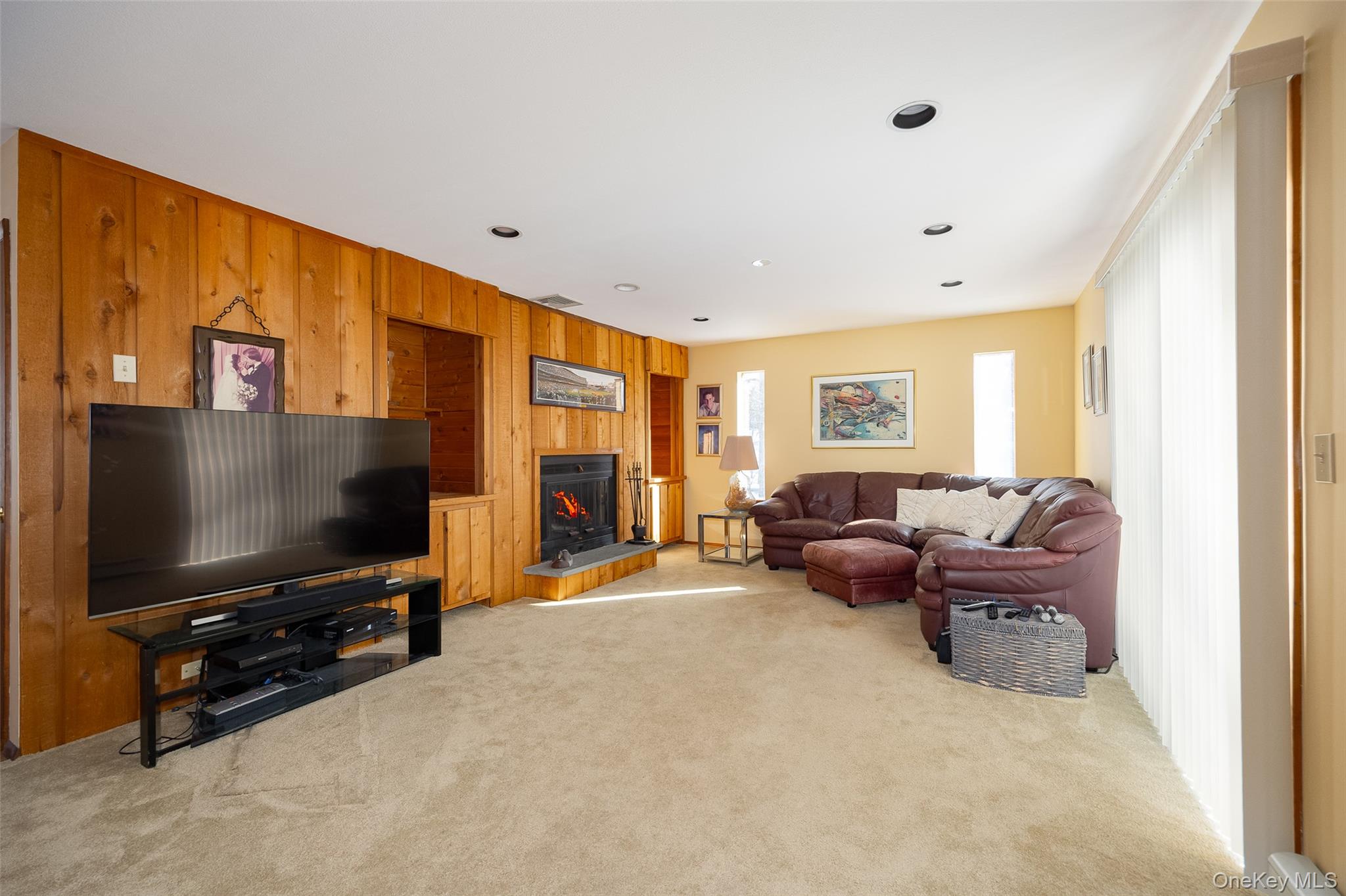 5 Chestnut Ridge Road Poughkeepsie, NY 12603 - Photo 10 of 39 a living room with furniture and a flat screen tv