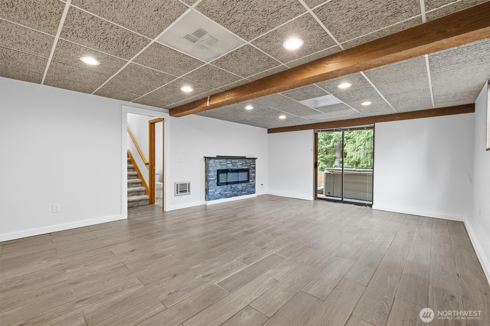 14312 63rd Avenue West Edmonds, WA 98026 - Photo 19 of 40 an empty room with wooden floor and a window