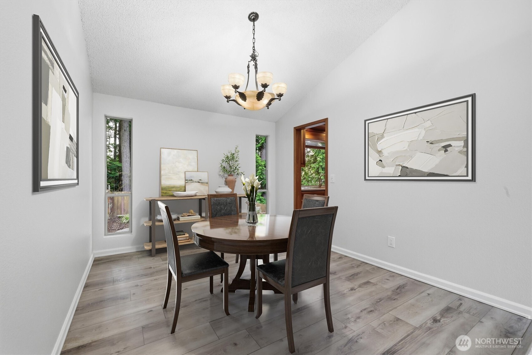 14312 63rd Avenue West Edmonds, WA 98026 - Photo 7 of 40 a view of a dining room with furniture window and wooden floor