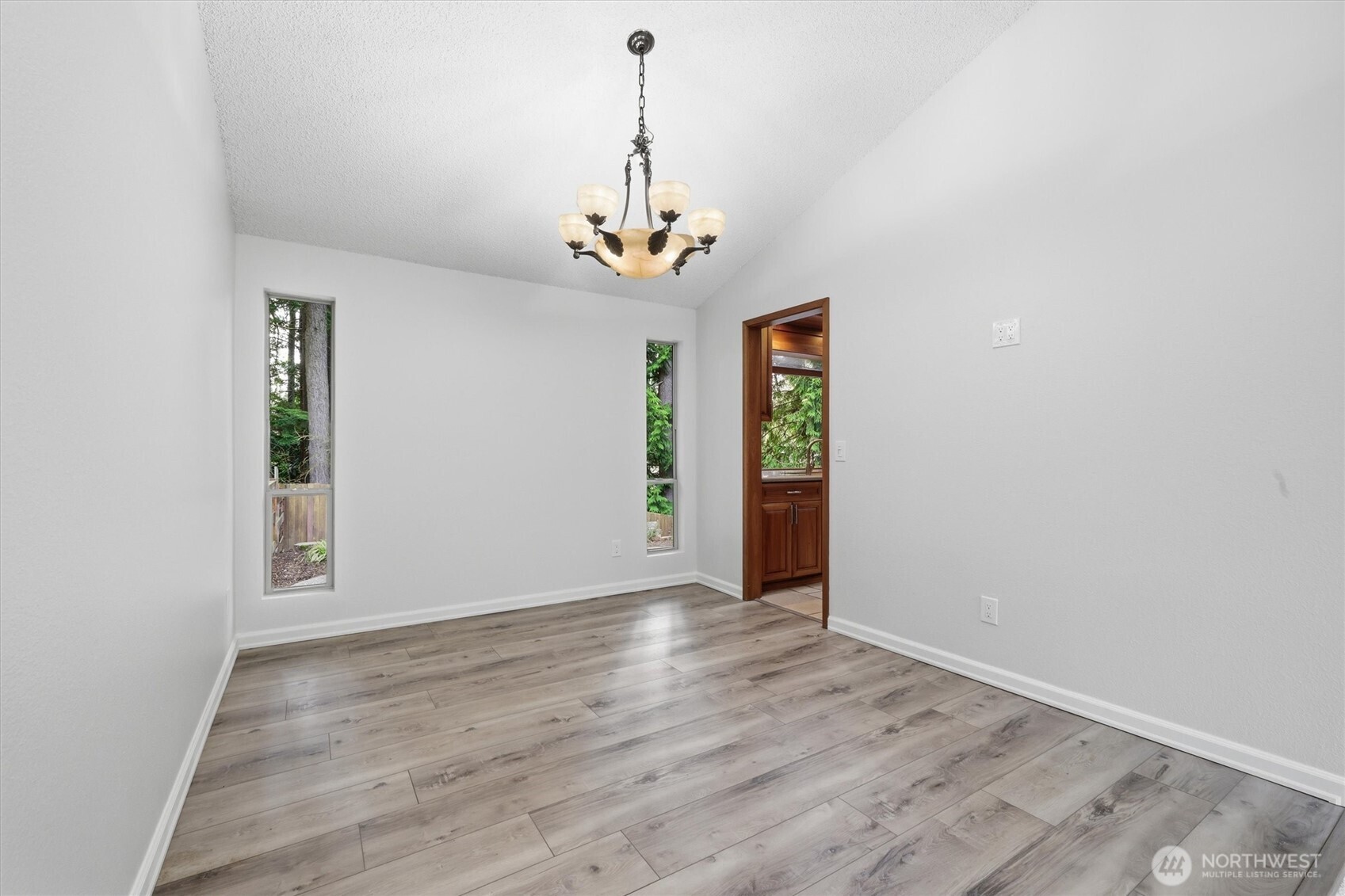 14312 63rd Avenue West Edmonds, WA 98026 - Photo 10 of 40 wooden floor in an empty room with a window