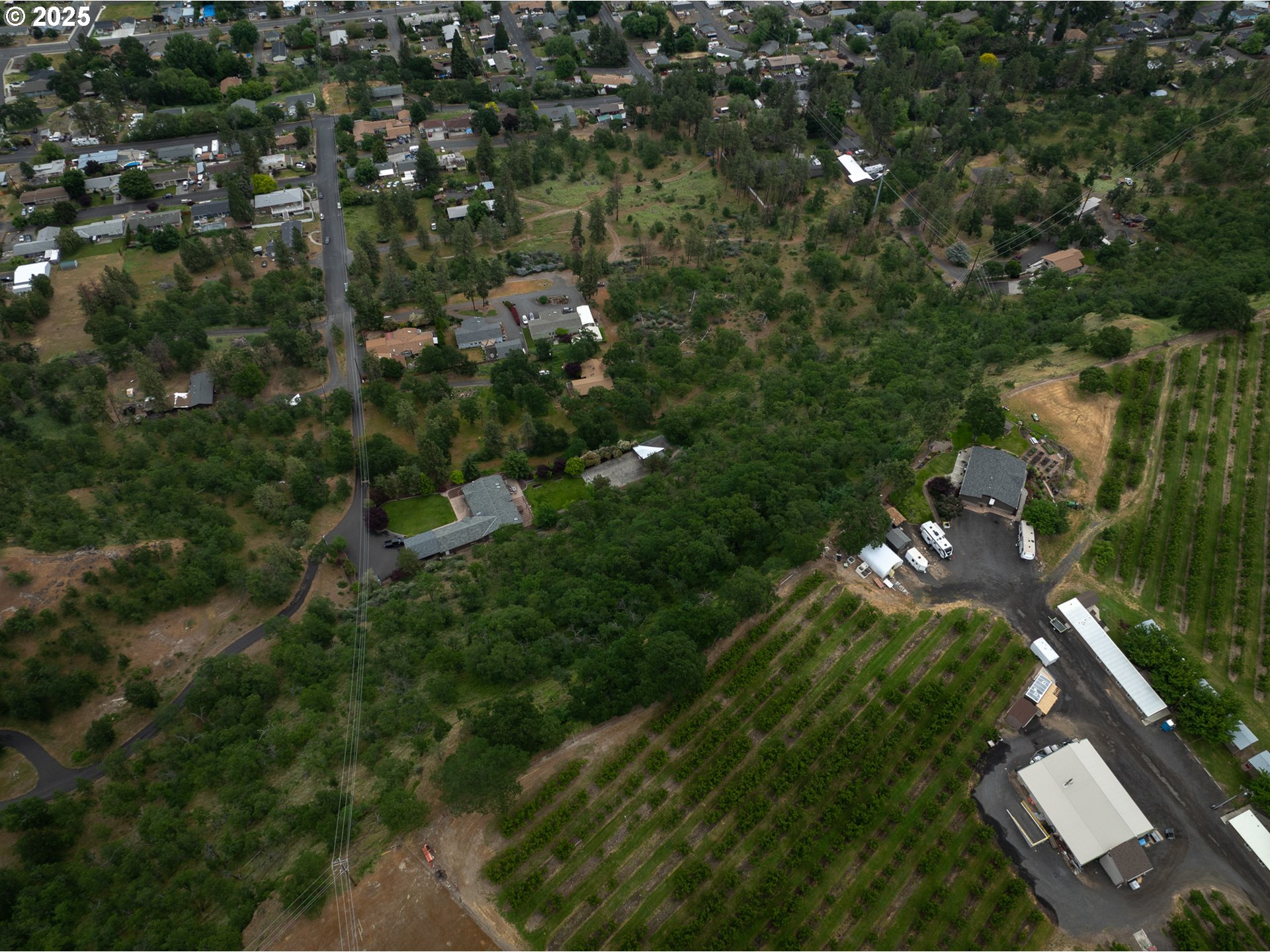 West 16th The Dalles, OR 97058 - Photo 2 of 10 an aerial view of residential houses with outdoor space and trees