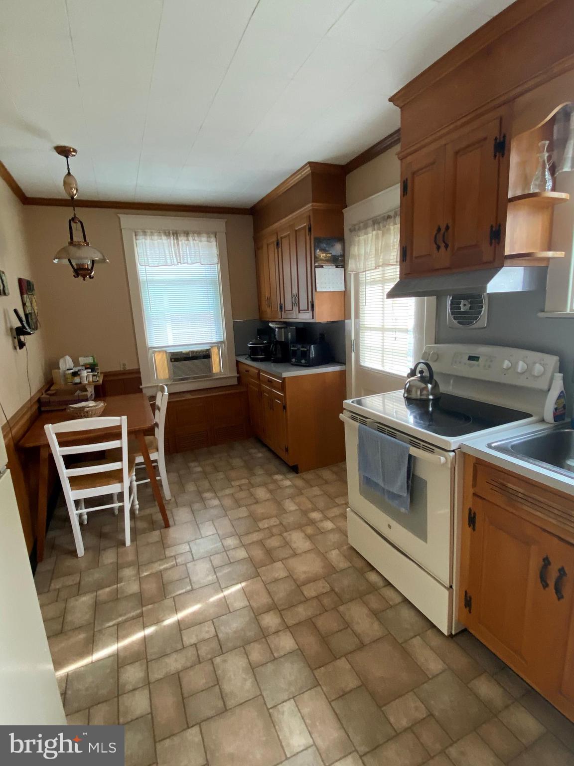 876 Pleasure Road Lancaster, PA 17601 - Photo 14 of 35 BREAKFAST AREA W/ EXTRA CABINETS