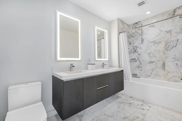 a bathroom with a sink and a toilet