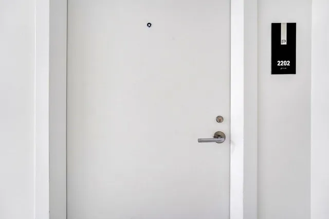 a view of a chairs and table in a balcony