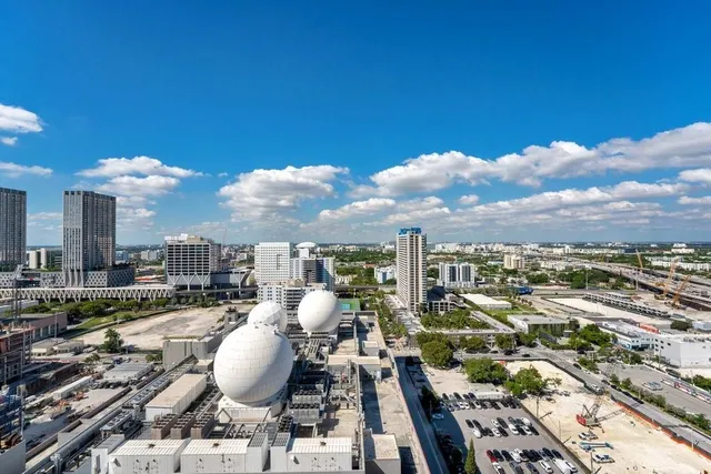 a view of city with tall buildings