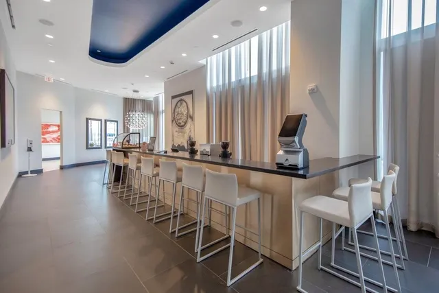 a view of a living room and entry way