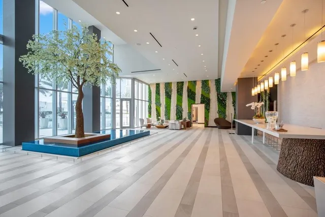a very nice looking living room with furniture and a flat screen tv