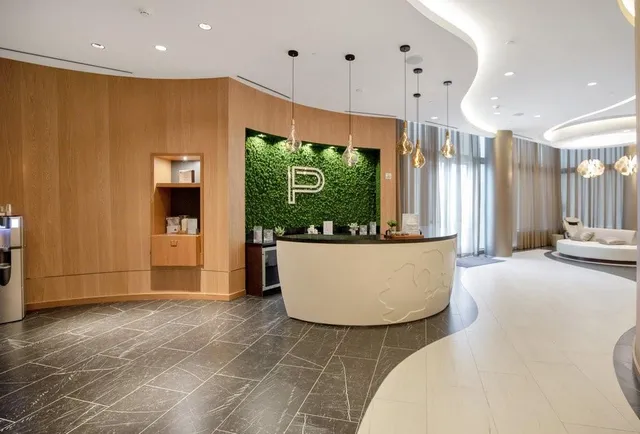 a view of swimming pool with outdoor seating