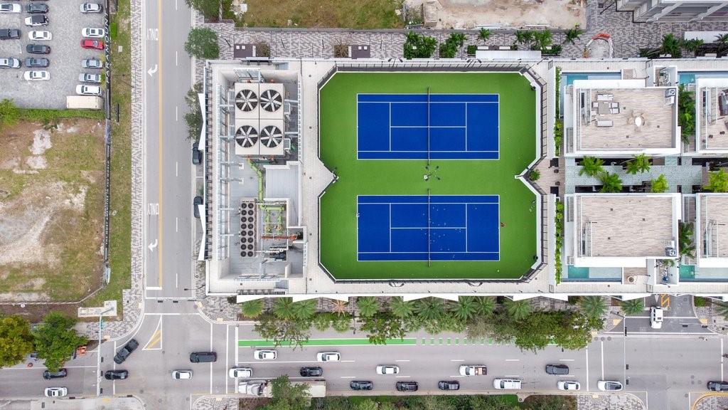 851 Northeast 1st Avenue, Unit 2202 Miami, FL 33132 - Photo 54 of 56 a view of building with a street