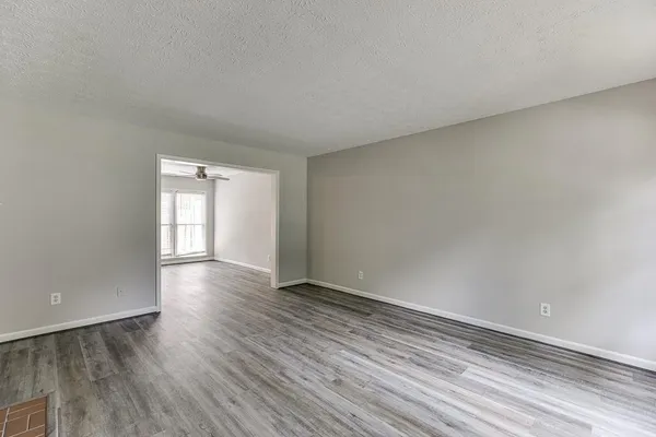 a view of an empty room and window