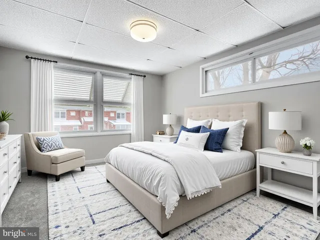 a view of a building with large trees