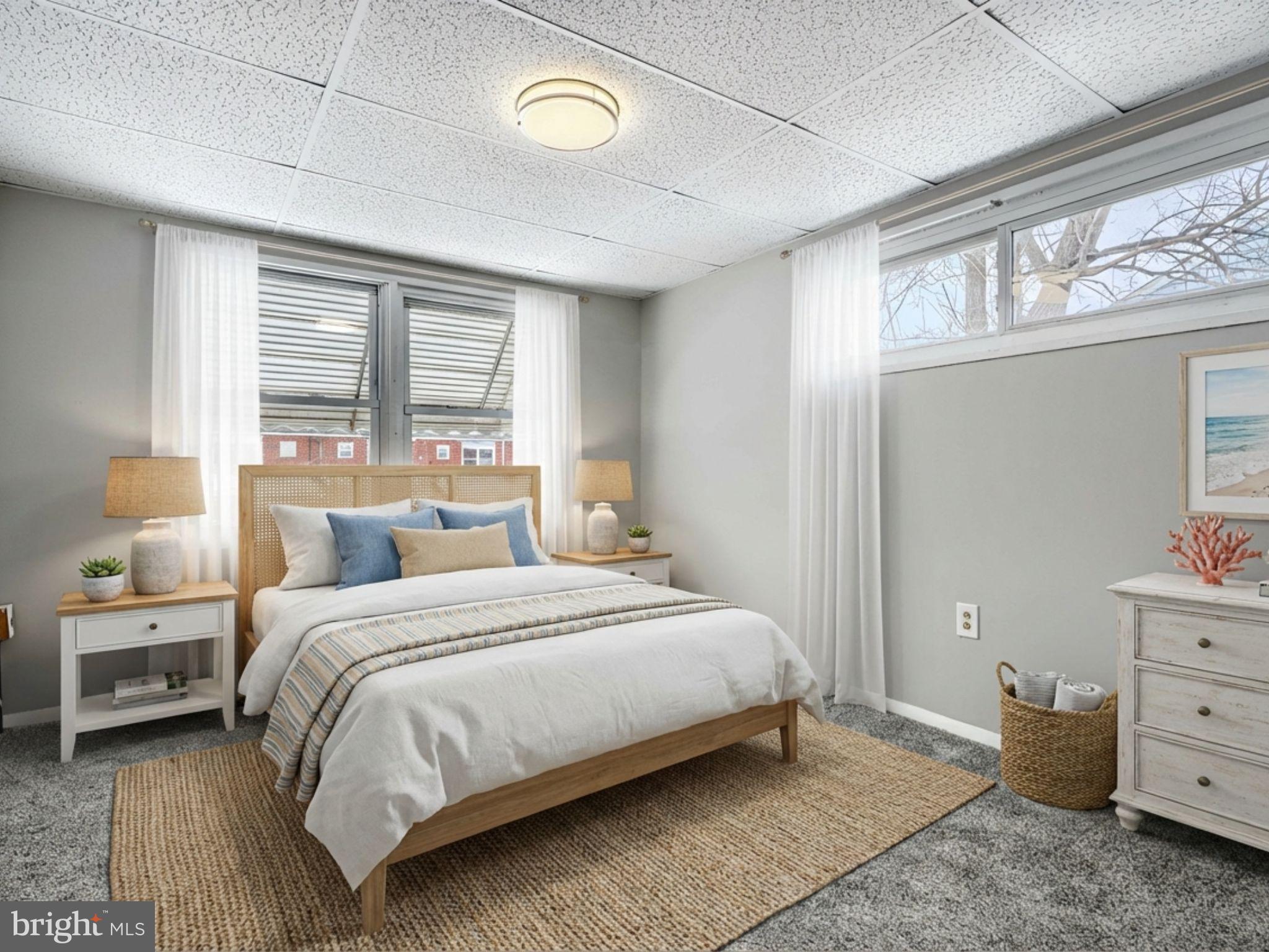 2014 Larkhall Road Dundalk, MD 21222 - Photo 33 of 44 a bedroom with a bed and window