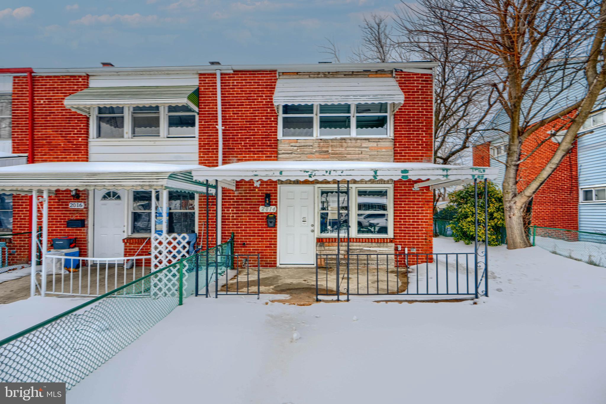 2014 Larkhall Road Dundalk, MD 21222 - Photo 42 of 44 front view of a house with a yard