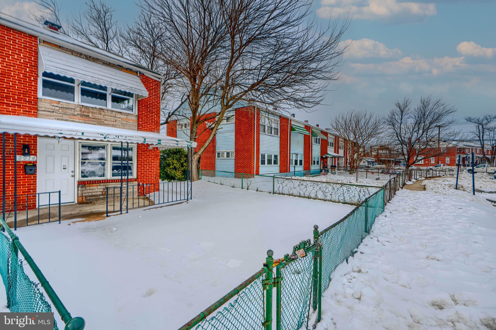 2014 Larkhall Road Dundalk, MD 21222 - Photo 43 of 44 a view of a building with large trees
