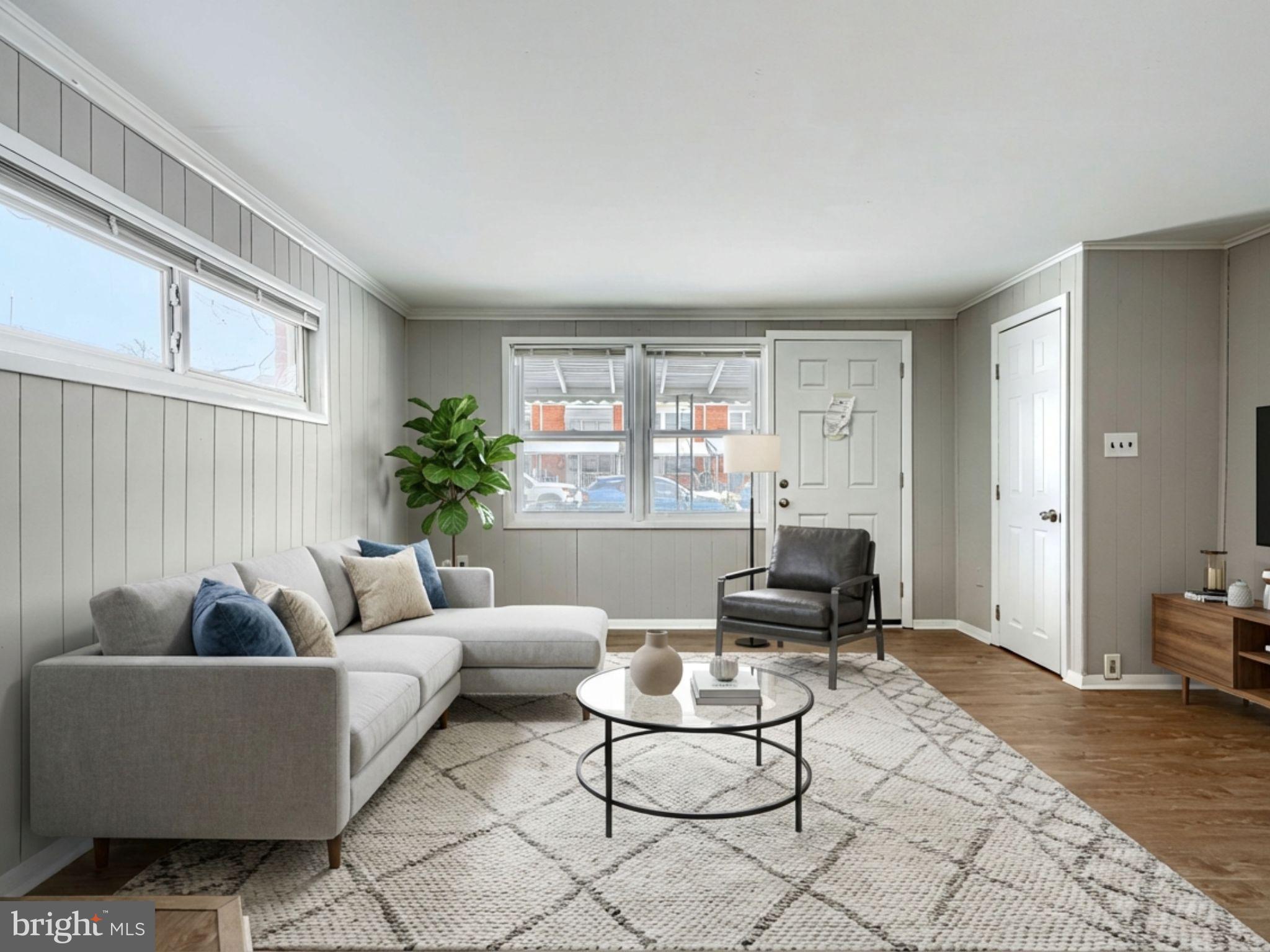 2014 Larkhall Road Dundalk, MD 21222 - Photo 8 of 44 a living room with furniture and a large window