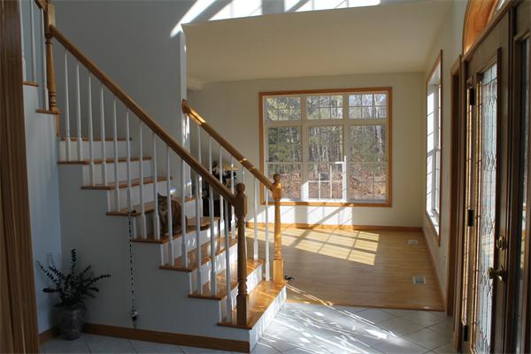 184 Rice Corner Road Brookfield, MA 01506 - Photo 11 of 15 a view of entryway and hall with wooden floor