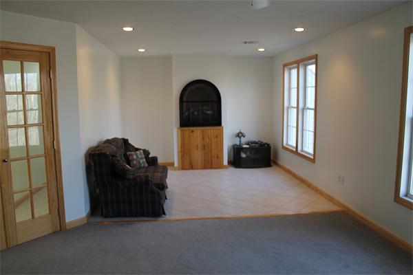184 Rice Corner Road Brookfield, MA 01506 - Photo 13 of 15 a living room with furniture and a window