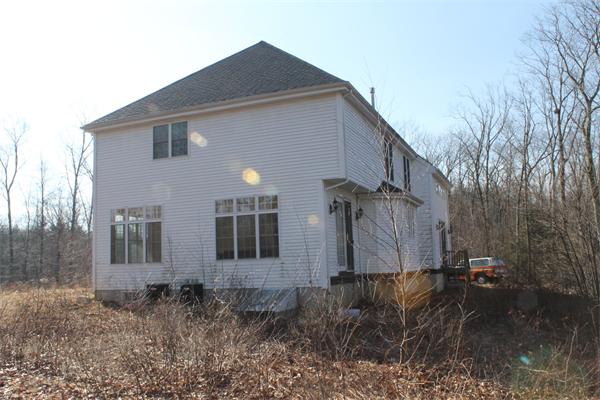 184 Rice Corner Road Brookfield, MA 01506 - Photo 2 of 15 a view of a house with a yard