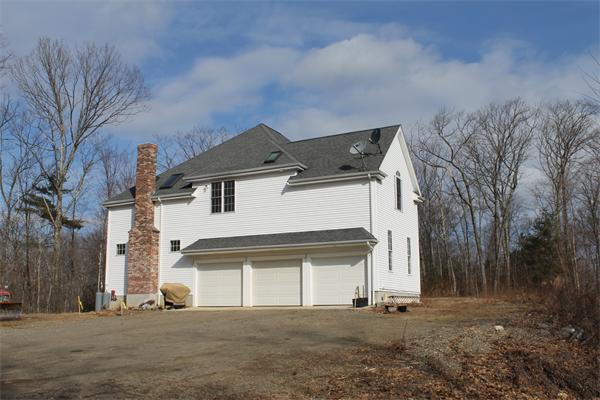 184 Rice Corner Road Brookfield, MA 01506 - Photo 3 of 15 a front view of a house with a yard