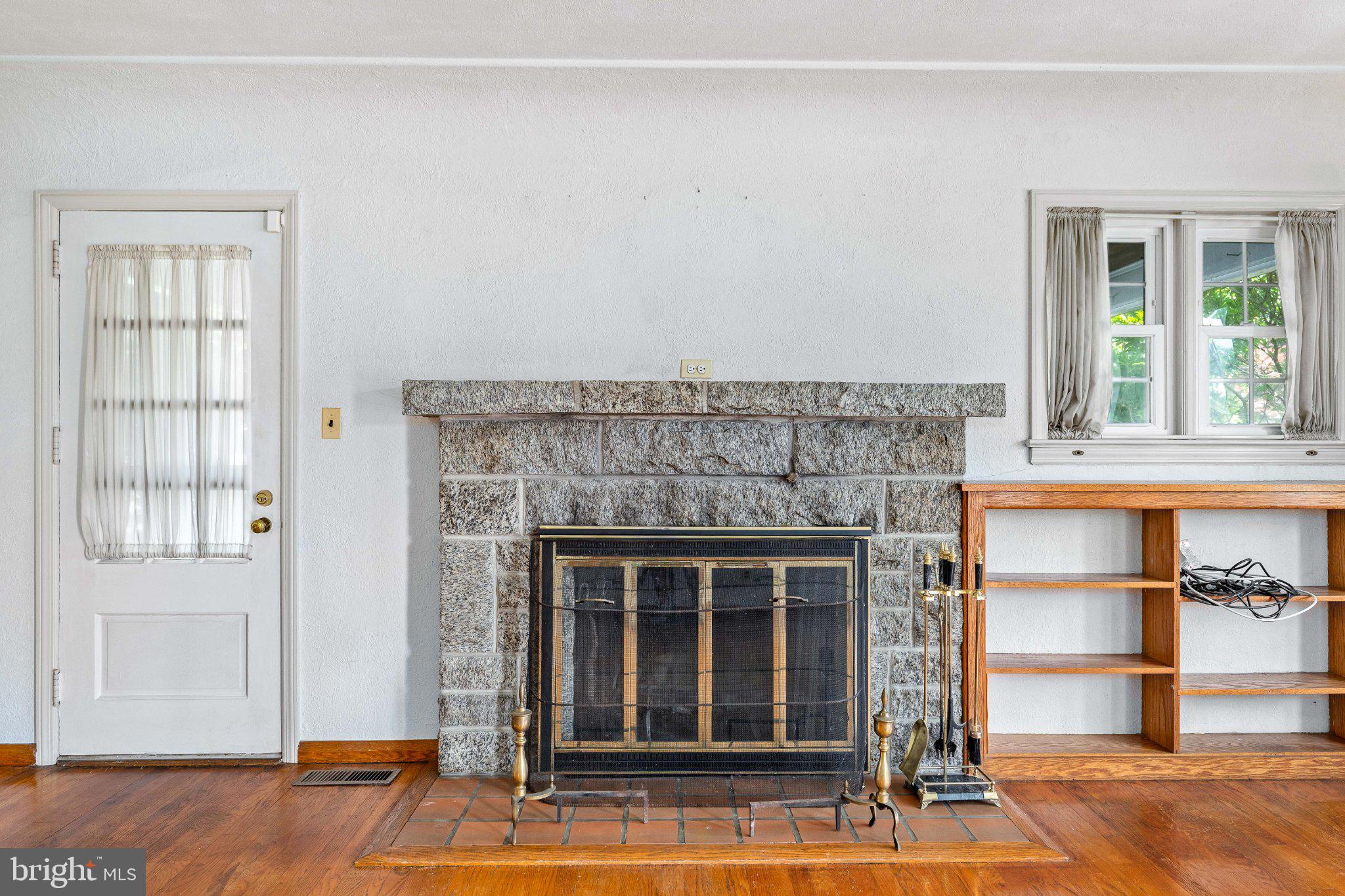 806 Long Bar Harbor Road Abingdon, MD 21009 - Photo 7 of 41 Charming space with a cozy fireplace.