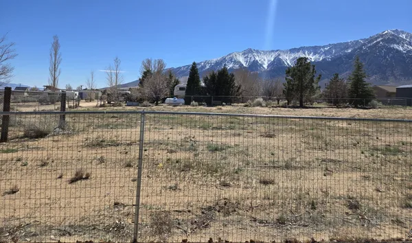 a view of a yard with a snow