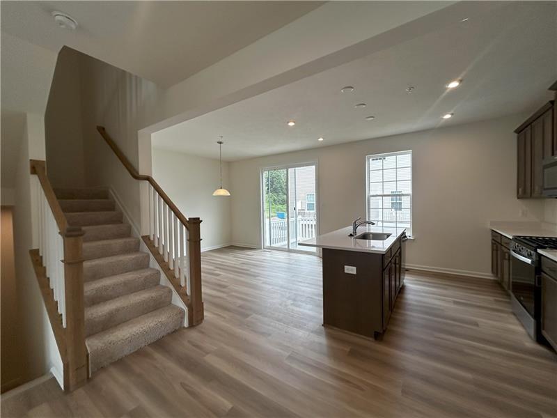 118 Affinity Drive Harmony, PA 16037 - Photo 7 of 8 a living room with wooden floor and furniture