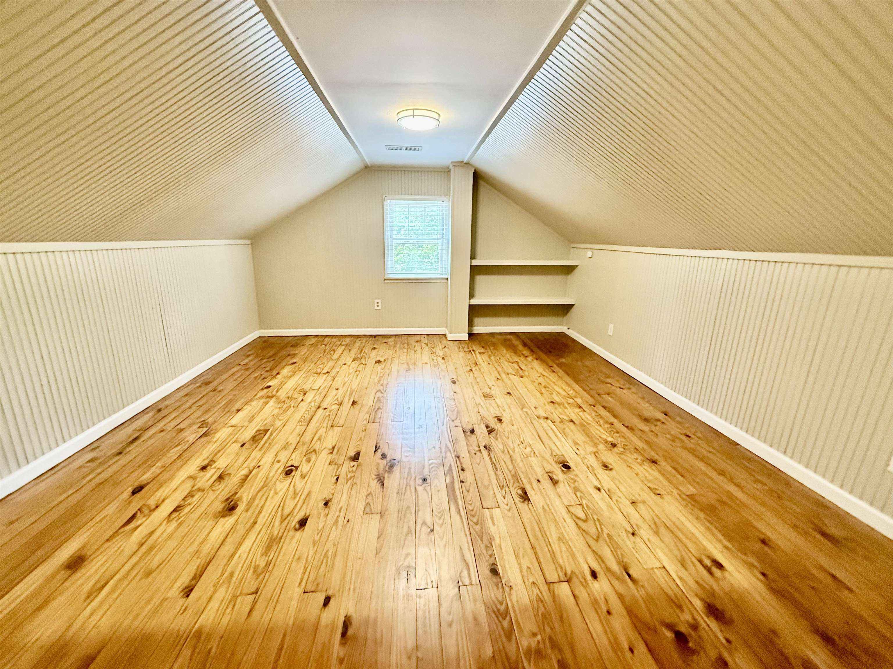 4120 Chambers Chapel Road Lakeland, TN 38002 - Photo 19 of 38 Bonus room with hardwood / wood-style flooring, lofted ceiling, and baseboards