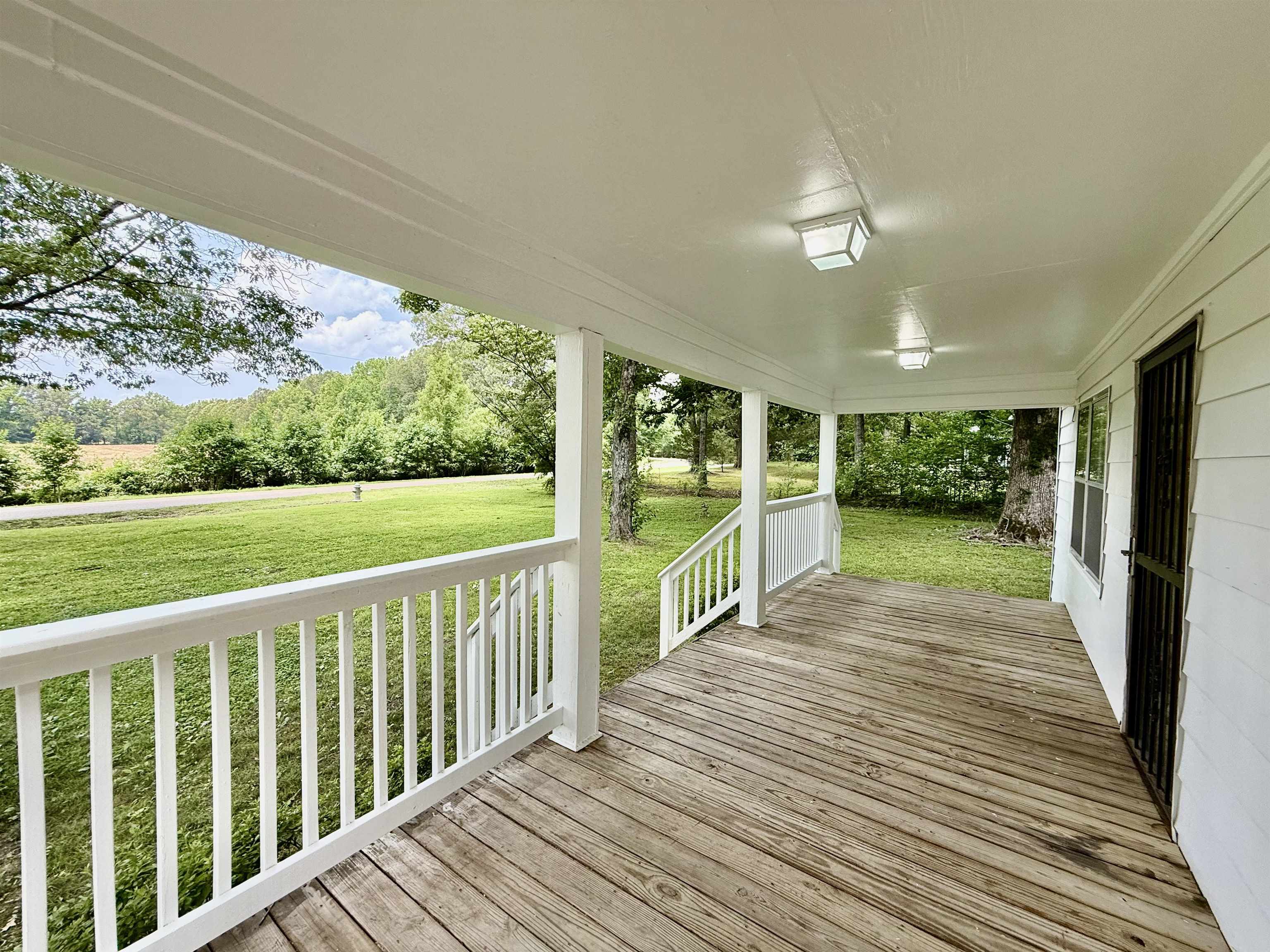4120 Chambers Chapel Road Lakeland, TN 38002 - Photo 28 of 38 Porch with a lawn