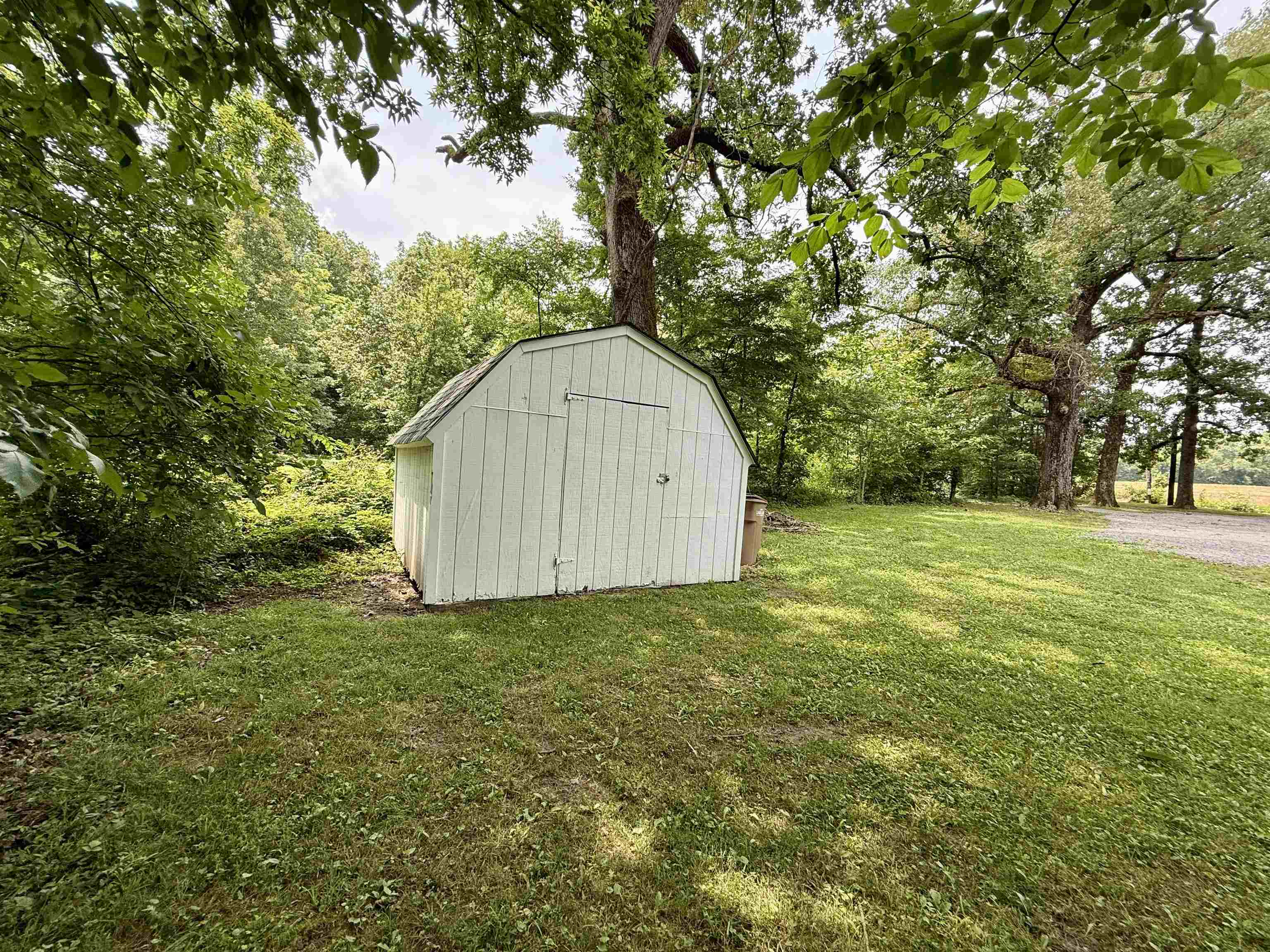 4120 Chambers Chapel Road Lakeland, TN 38002 - Photo 30 of 38 View of shed featuring a forest view