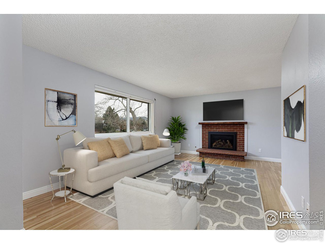 720 Mohawk Drive Boulder, CO 80303 - Photo 3 of 39 Living room open to dining and kitchen