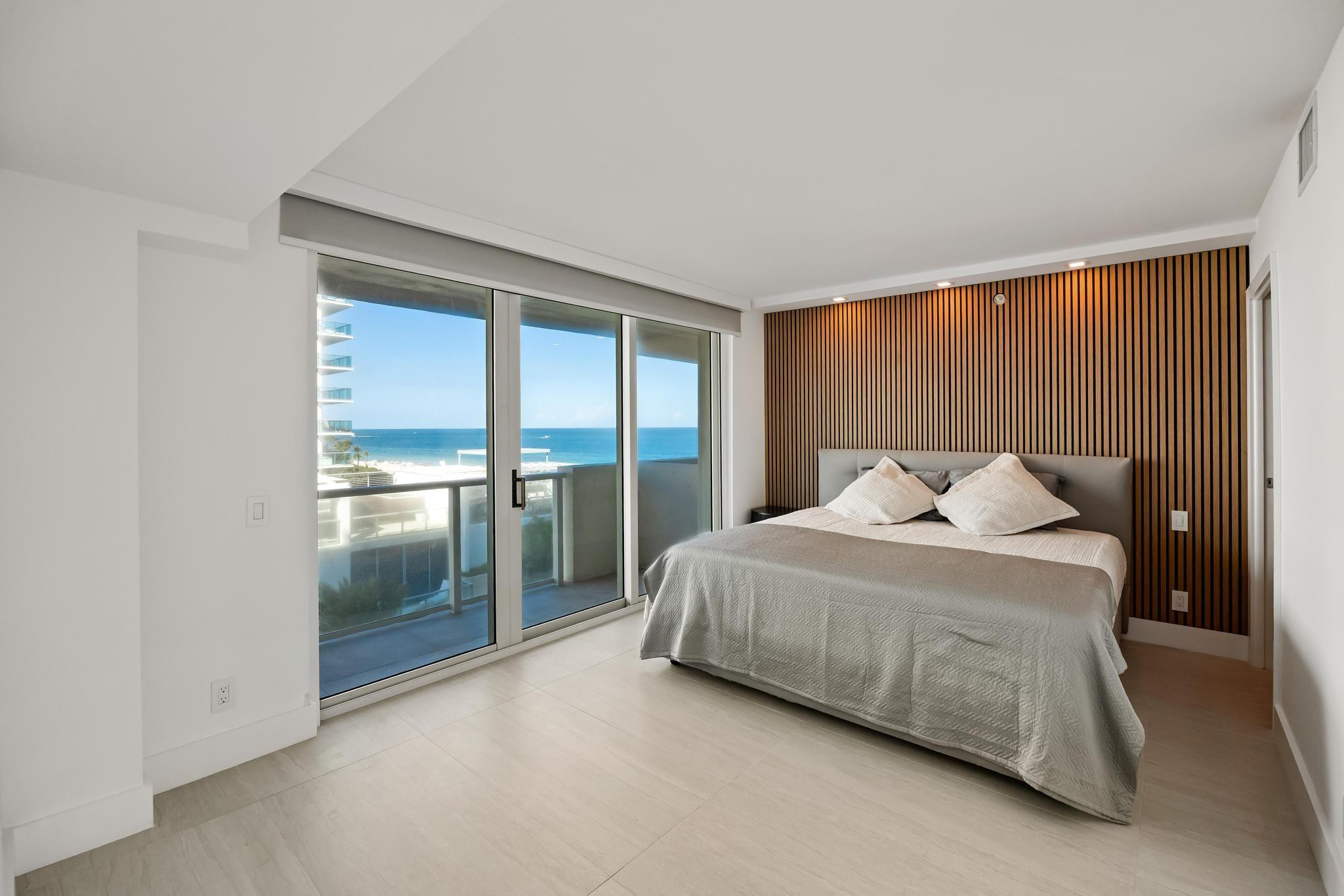 9499 Collins Avenue, Unit 603 Surfside, FL 33154 - Photo 12 of 42 primary bedroom w/balcony