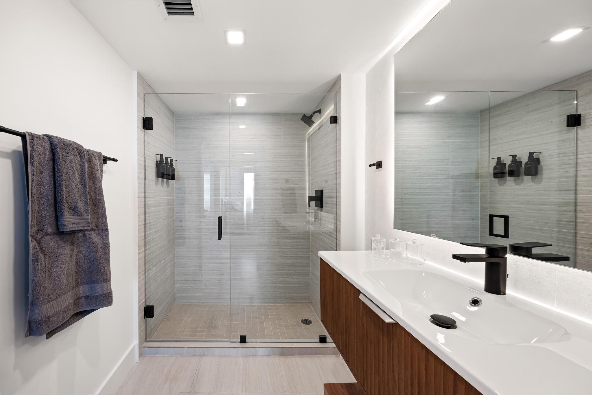 9499 Collins Avenue, Unit 603 Surfside, FL 33154 - Photo 13 of 42 Primary bathroom