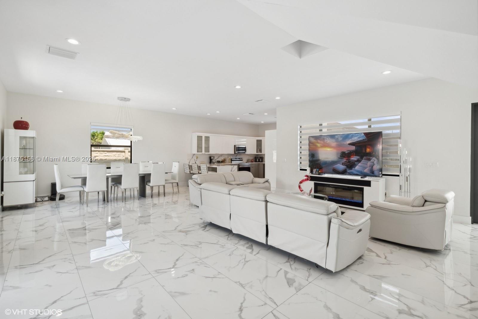 13331 Southwest 41st Street Miami, FL 33175 - Photo 3 of 8 a living room with furniture and white furniture