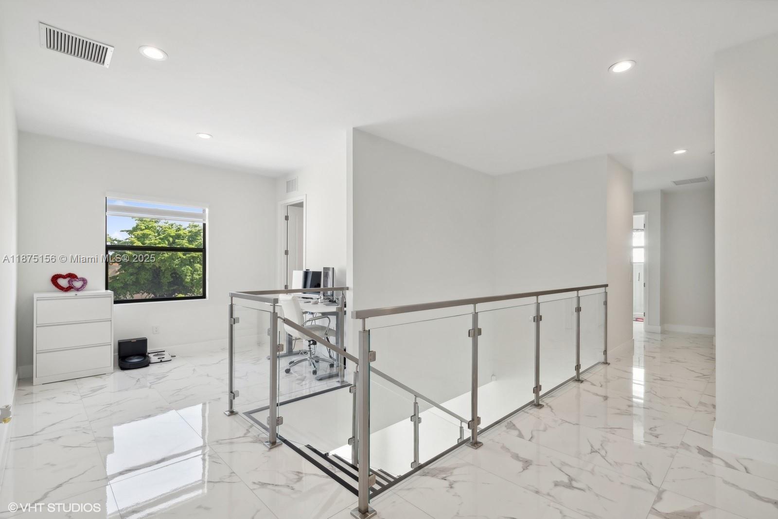 13331 Southwest 41st Street Miami, FL 33175 - Photo 6 of 8 a view of living room filled with furniture and a flat screen tv
