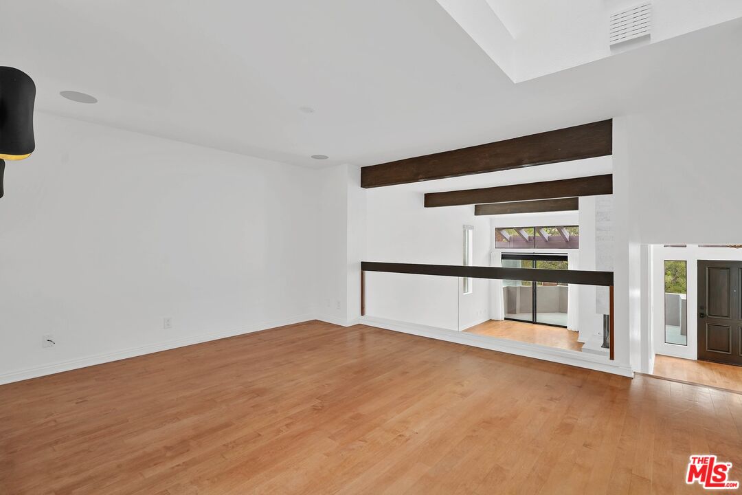 1569 Michael Lane Pacific Palisades, CA 90272 - Photo 11 of 31 a view of empty room with wooden floor