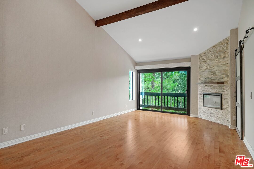 1569 Michael Lane Pacific Palisades, CA 90272 - Photo 21 of 31 a view of an empty room with a window