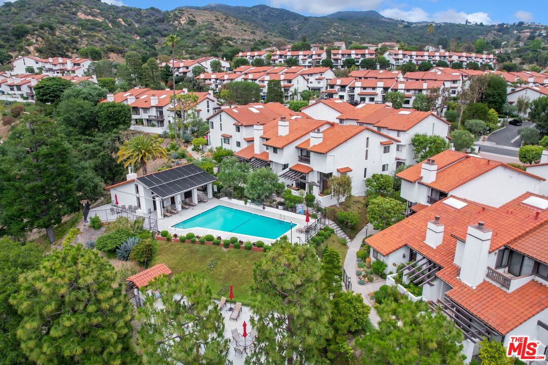 1569 Michael Lane Pacific Palisades, CA 90272 - Photo 31 of 31 an aerial view of residential houses with outdoor space and trees