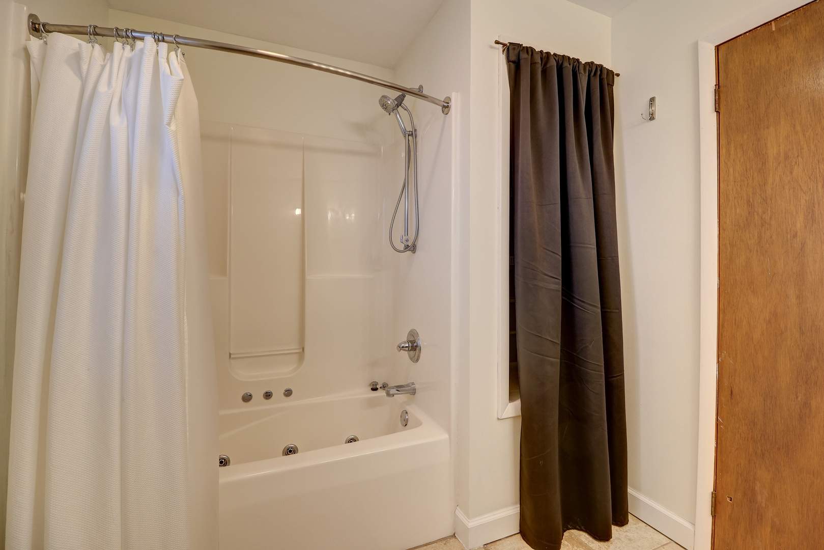 1305 3rd Avenue Sterling, IL 61081 - Photo 11 of 29 a bathroom with a shower and a tub