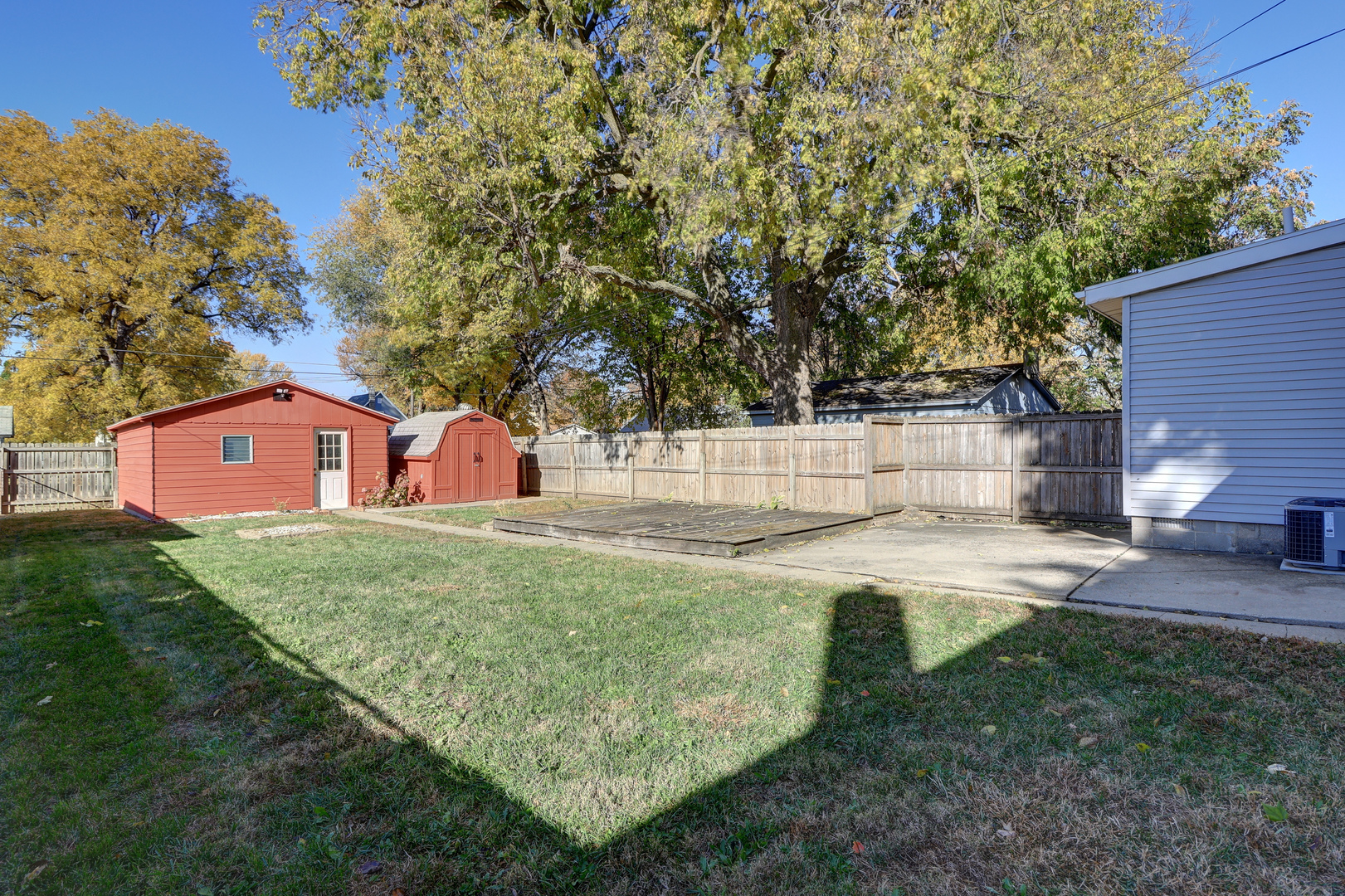 1305 3rd Avenue Sterling, IL 61081 - Photo 21 of 29 a view of a backyard with tree s