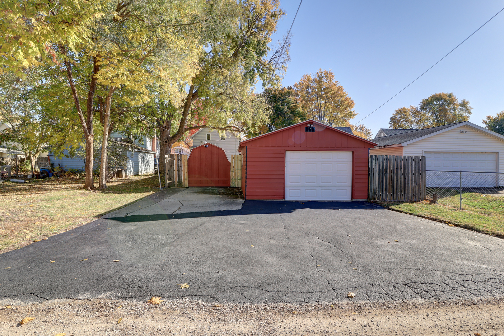 1305 3rd Avenue Sterling, IL 61081 - Photo 23 of 29 a front view of a house with a yard and garage