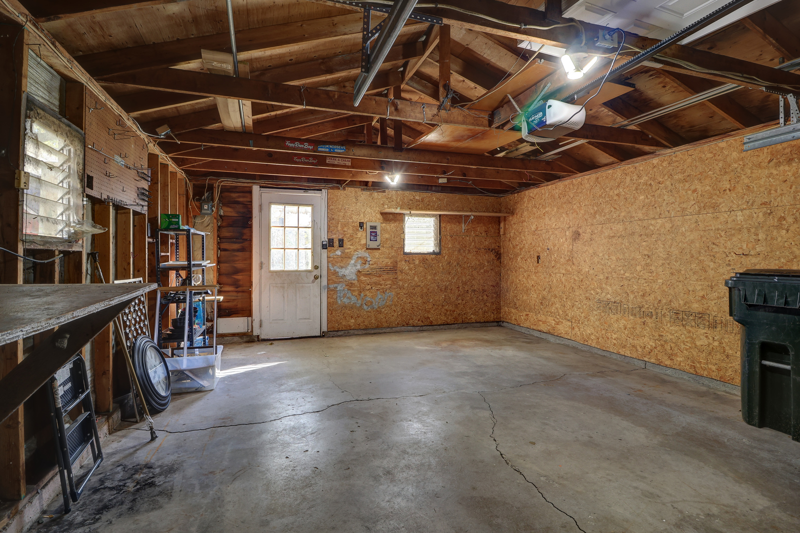 1305 3rd Avenue Sterling, IL 61081 - Photo 25 of 29 a view of an empty room with wooden walls
