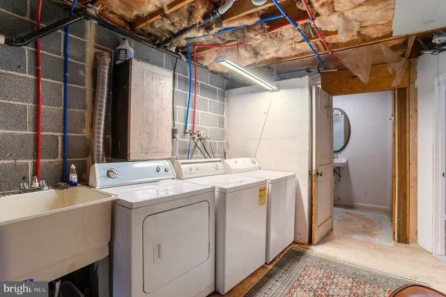 a utility room with a washer and dryer