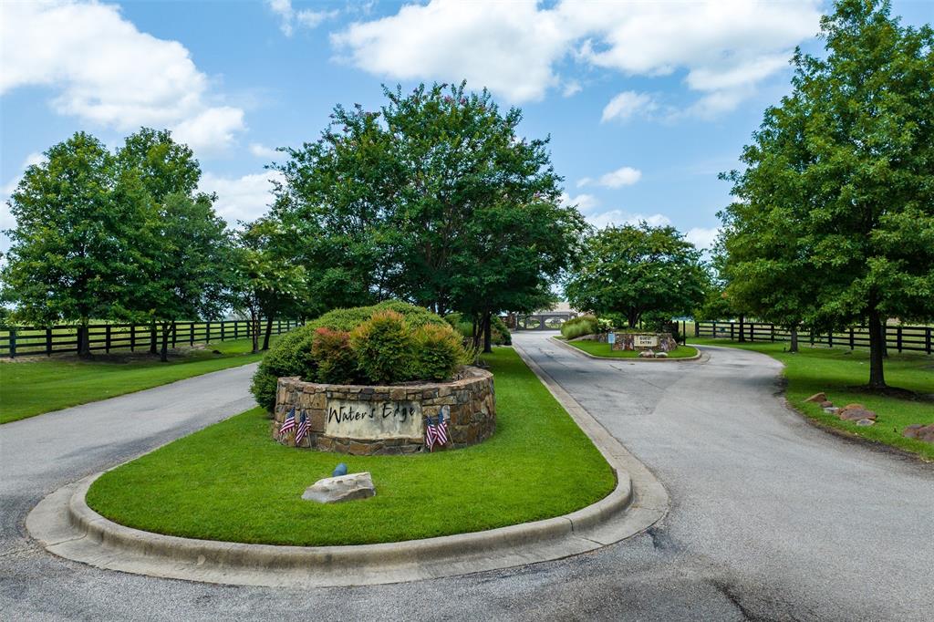 7710 Shore Crest Way Athens, TX 75752 - Photo 6 of 17 a view of a swimming pool with big trees