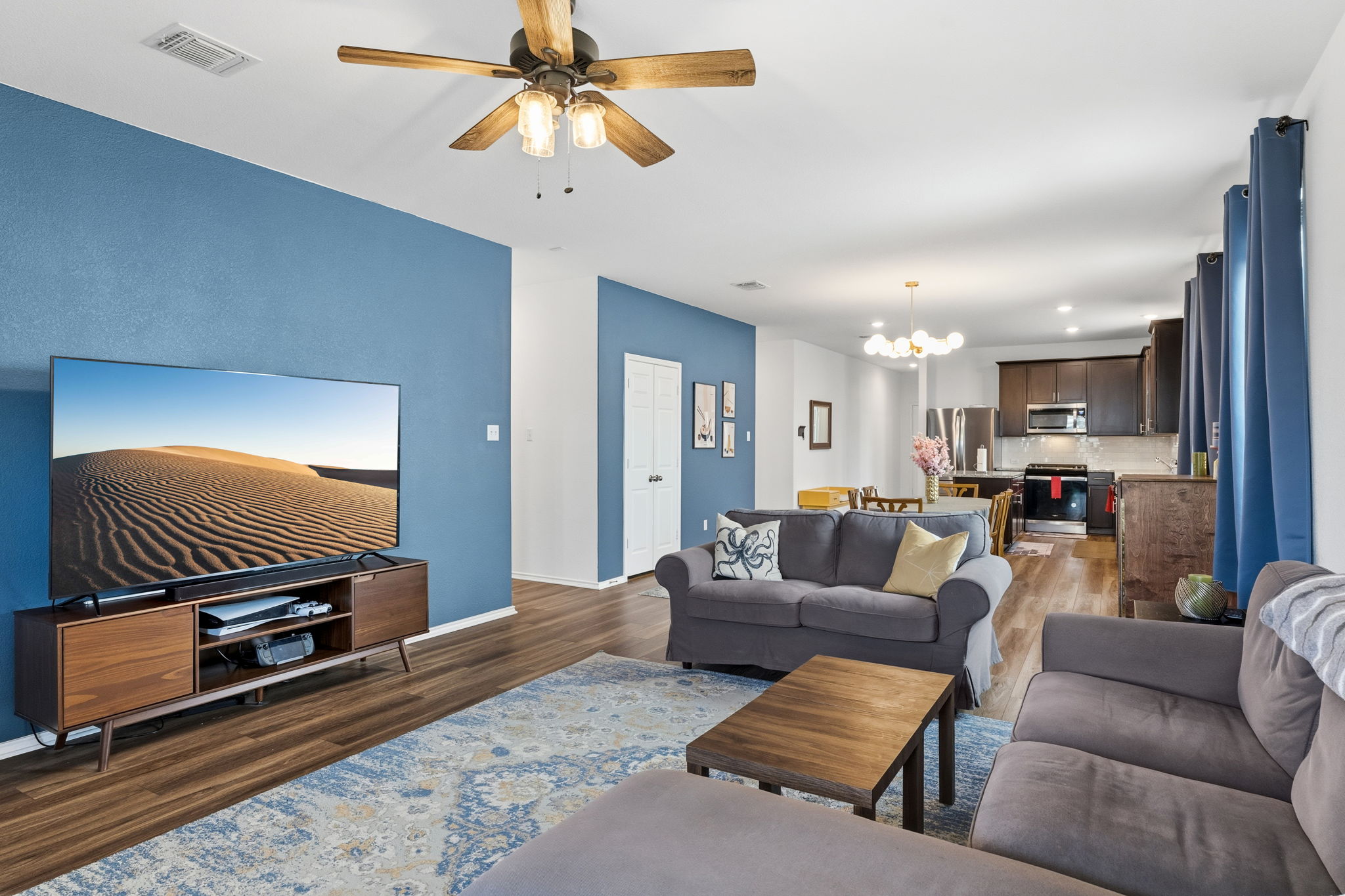 1600 Hope Rnch Road Leander, TX 78641 - Photo 10 of 23 a living room with furniture ceiling fan and a rug