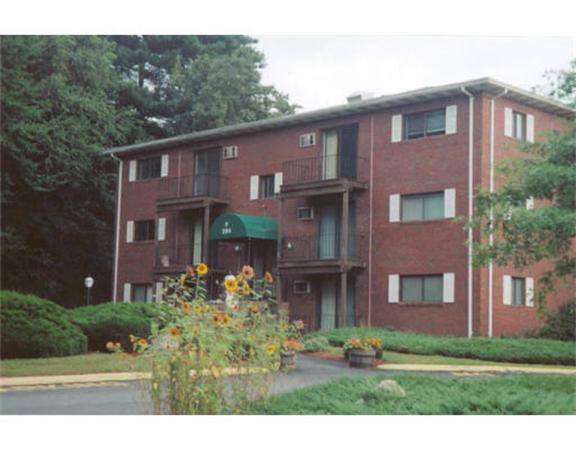 318 Codman Hill Road, Unit 34E Boxborough, MA 01719 - Photo 1 of 14 a front view of a house